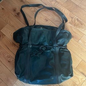 Beautiful vintage Leather by Mann tote in dark green